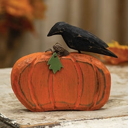 Distressed Carved Wooden Crow on Pumpkin